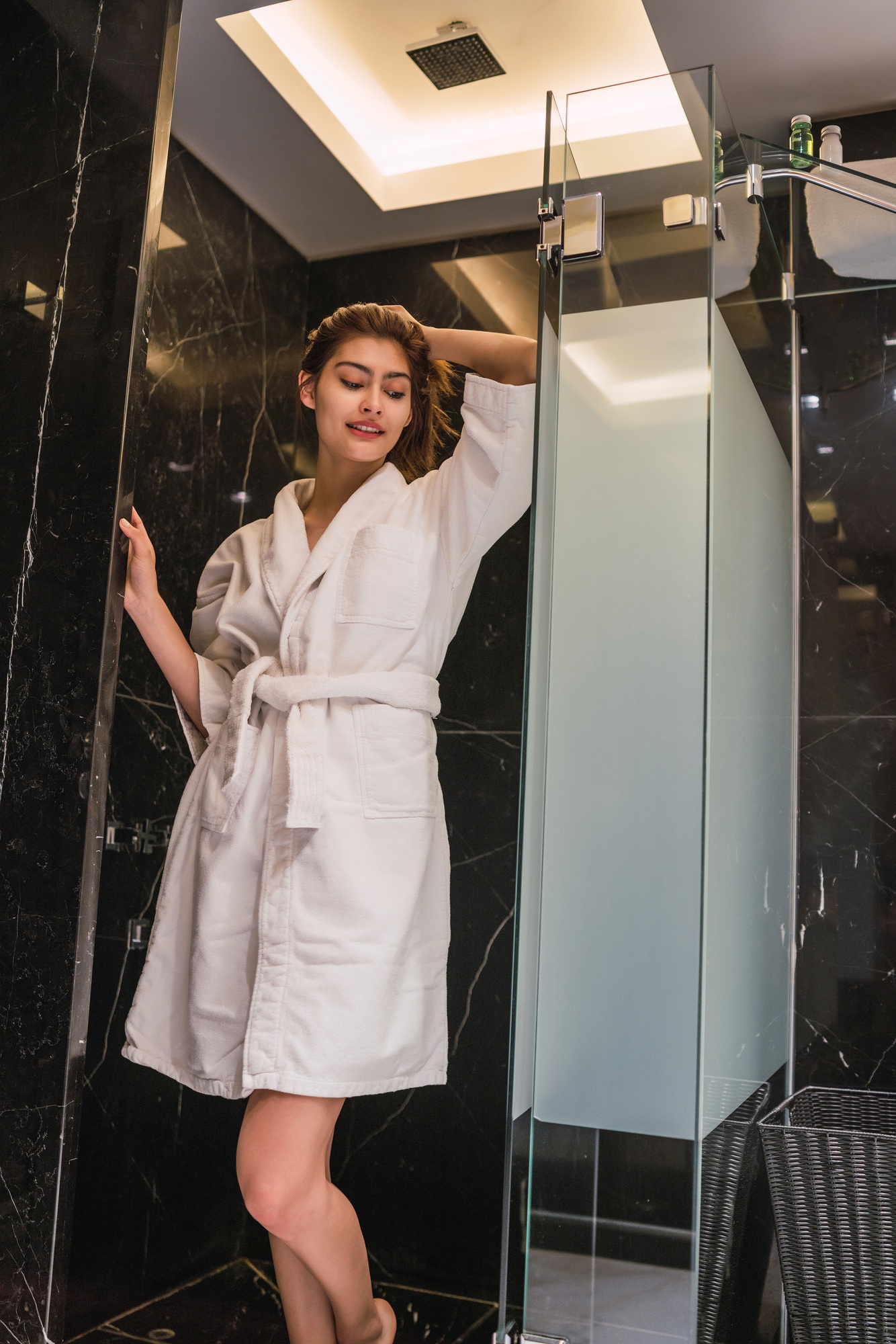 Woman relaxed after taking a shower at the spa.